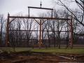 Camp Barn Frame Dismantle / A bent being flown to the dismantle area
